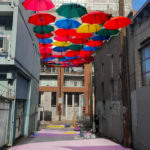 umbrellas over an alley
